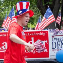 Kootenai GOP Treasurer Doug Balija walking in the American Heroes parade, downtown Coeur d'Alene