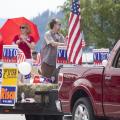 A truck pulls a trailer full of Republican politicians and candidates through downtown Coeur d'Alene by City Park - Photo courtesy of 29k Productions