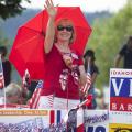 Idaho District 4 Senator candidate Mary Souza smiles and waves at the people along the Coeur d'Alene Independence Day Parade route - Photo courtesy of 29k Productions