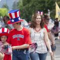 Kootenai County Republicans had a lot of flags to give out to spectators along the 2014 Coeur d'Alene Independence Day Parade route - Photo courtesy of 29k Productions