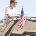 Young Kootenai County Republican riding on a WWII Deuce and a Half Truck in the Hayden Days Parade - Photography by 29k Productions